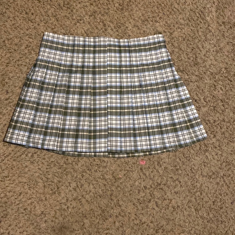 Plaid green skirt.
